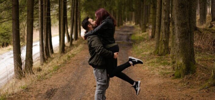 man carrying her girlfriend