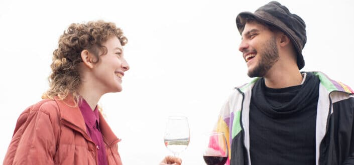 Man and woman drinking wine