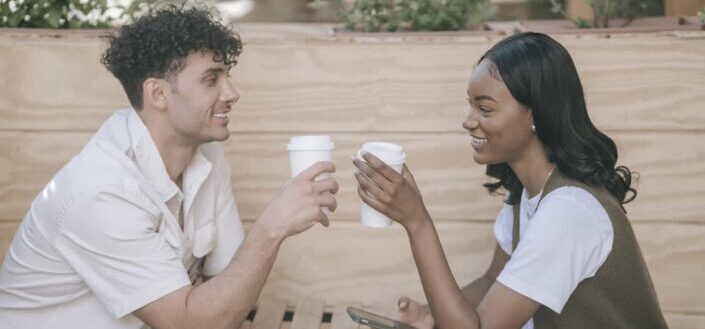 Man and woman happily looking at each other