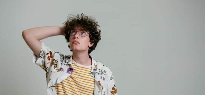 Man in a Floral Polo in Deep Thought