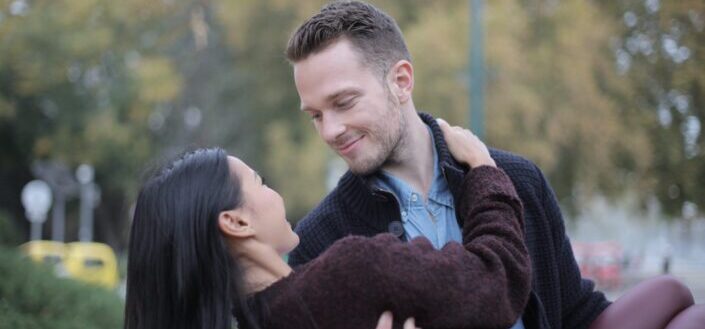 Man Lifting a Woman