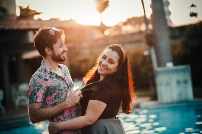 Couple Smiling by the Pool