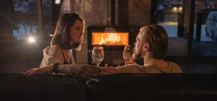 Couple Holding Glasses of Wine