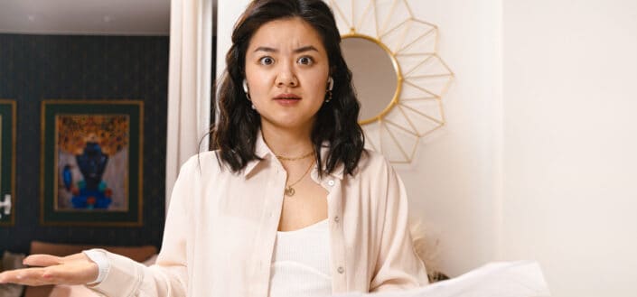 shocked woman in living room