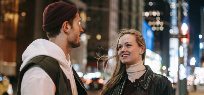 Romantic couple standing on street