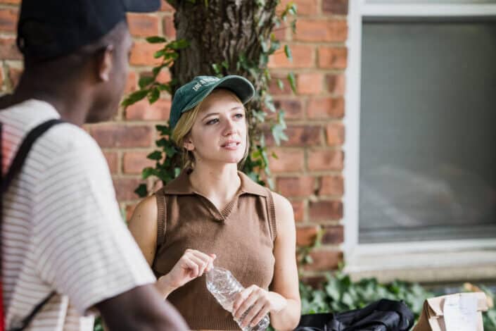 a couple talking outside