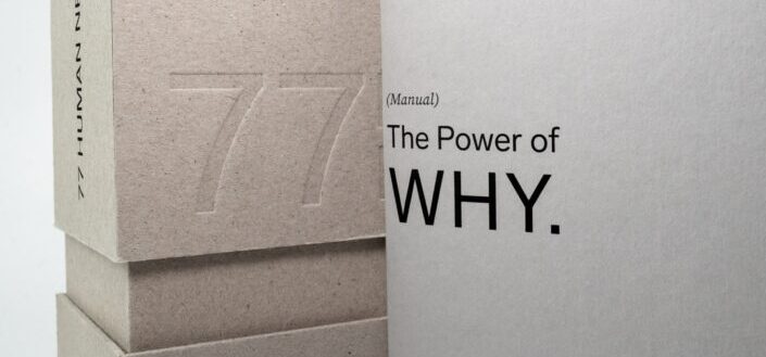 The number 77 is carved on the wall