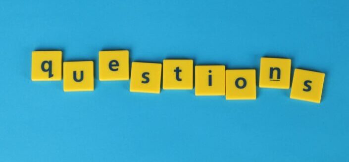 Yellow letter tiles on blue background