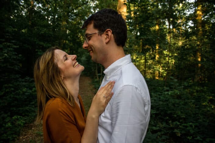 A couple smiling at each other