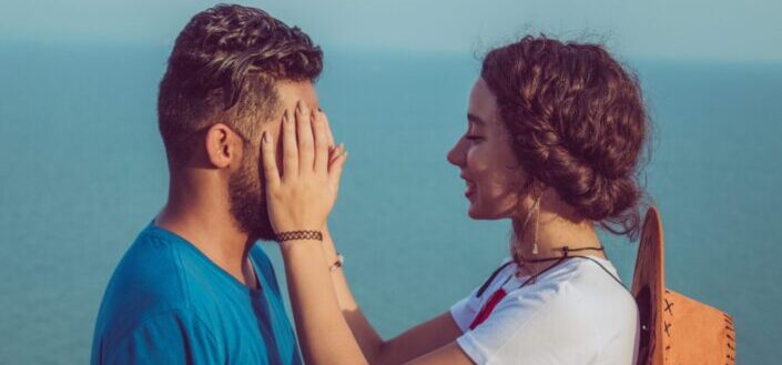 couple standing near the beach