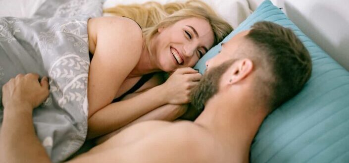Couple lying in bed