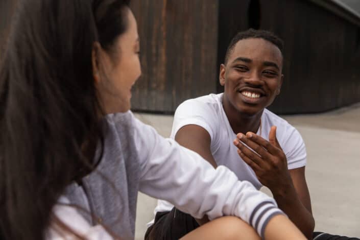 Happy multiethnic friends laughing together 