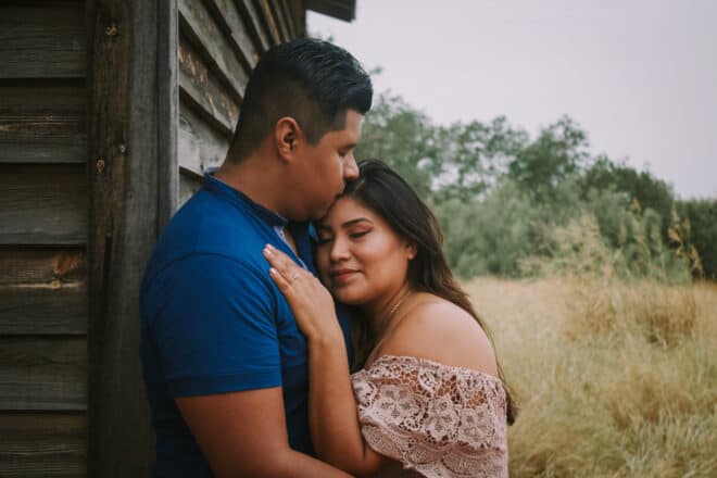 Couple at shabby barn in nature - cute spanish nicknames for boyfriend