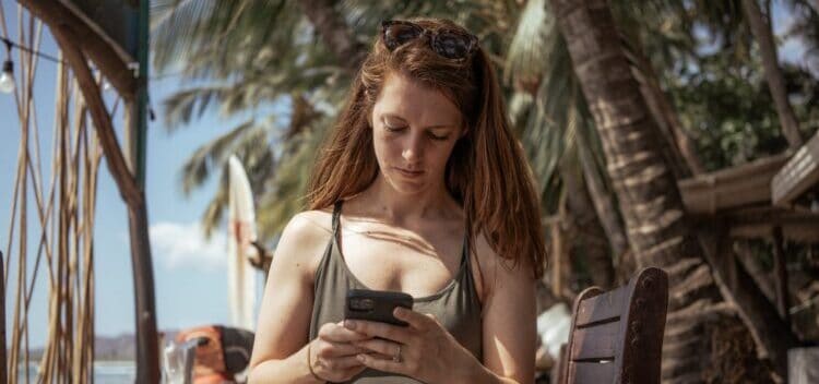 woman checking her phone 