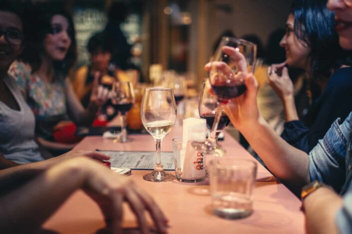 People Drinking and Eating Together