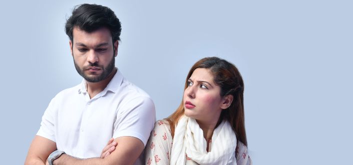 Woman looking at a man