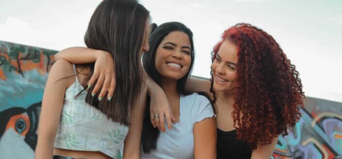 three women laughing