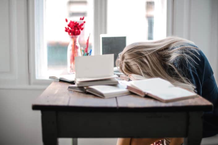 Woman asleep on table