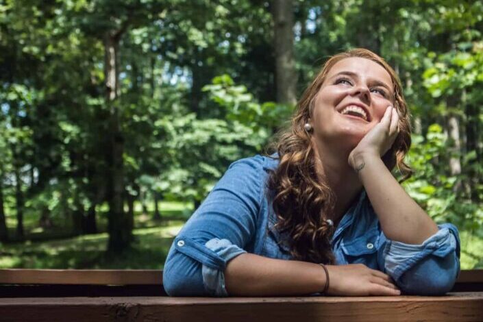 Woman looking up smiling
