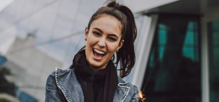 woman wearing scarf smiling