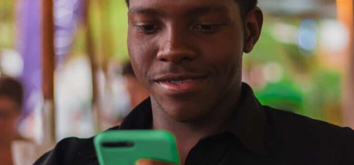 Man Looking at His Phone
