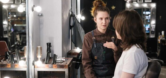 Hairstylist Talking to Her Client