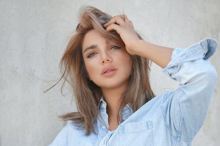 Woman in Blue Denim Button Up Jacket