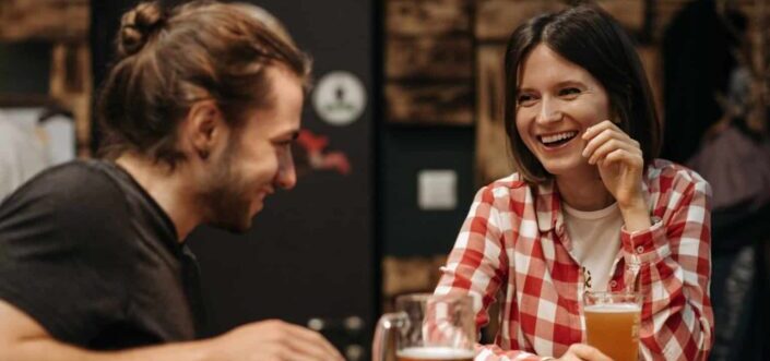 Man and woman drinking beer
