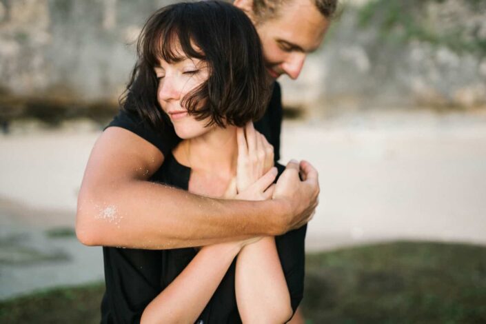 Man hugging a woman