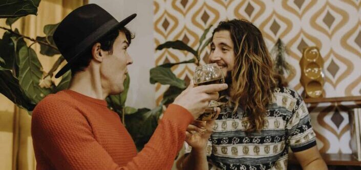 Men with Alcoholic Drinks Talking