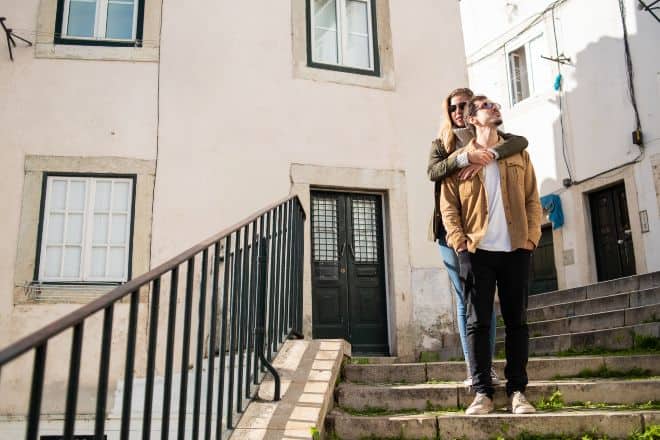 couple standing together embracing - Rebound Relationships Signs