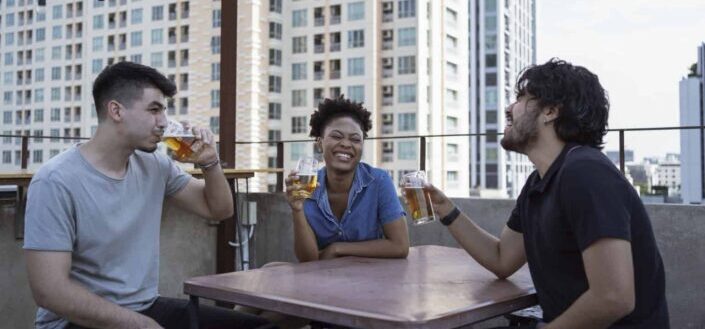Group of Friends Drinking Beer Having Fun