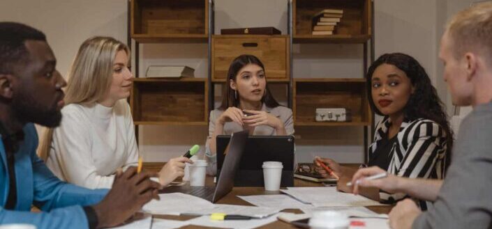 Officemates Conducting a Business Meeting
