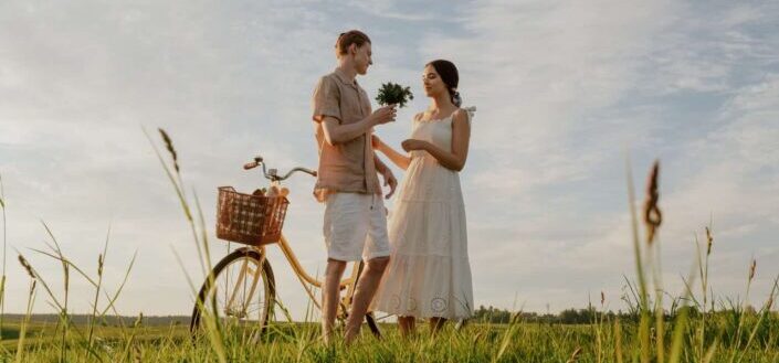 Man Giving Flowers to a Woman