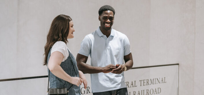 Man and Woman Having a Fun Conversation