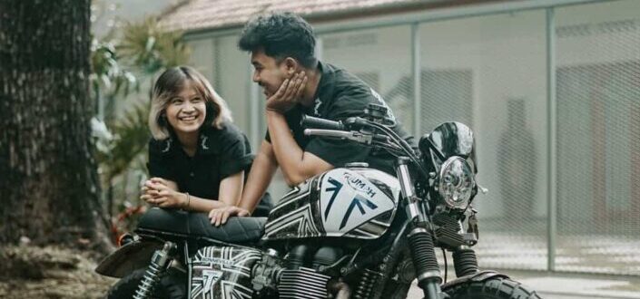 Man and Woman Leaning on a Motorcycle