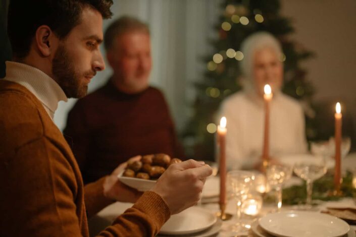 Man Holding a Plate of Food