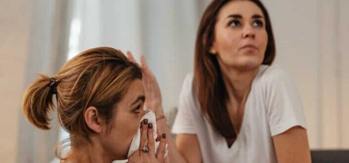 Sad women in a living room