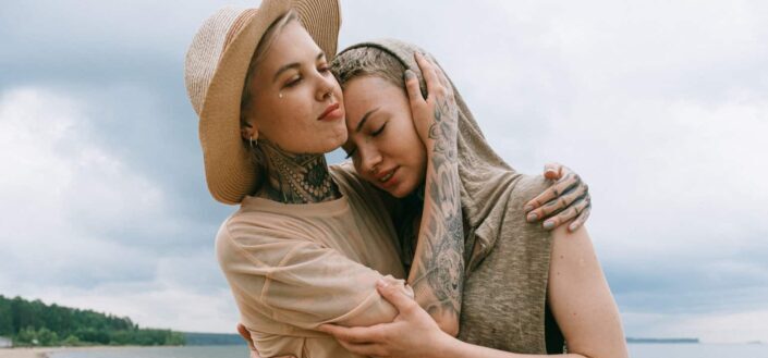 Woman comforting friend
