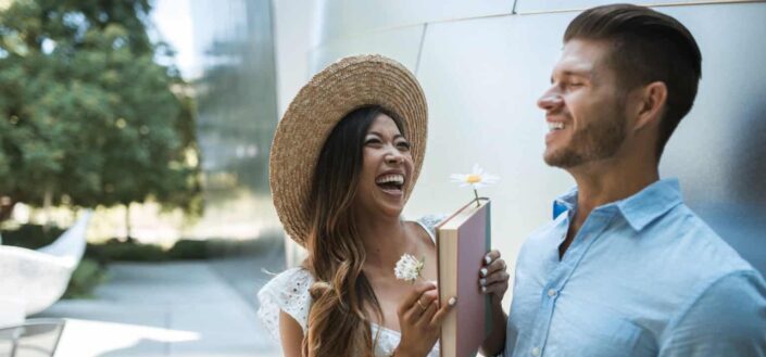 A happy couple laughing together