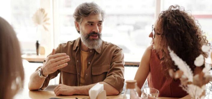A man and woman talking together
