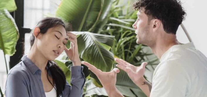 Angry man talking to a woman