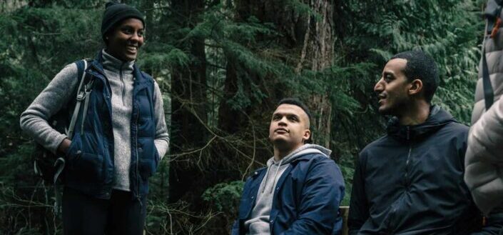 Friends Having a Conversation in the Woods