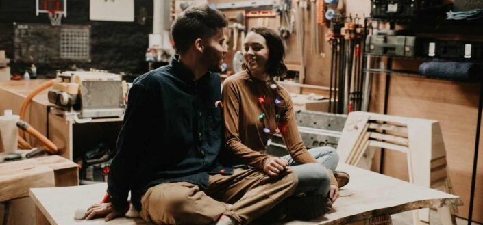man and woman smiling at each other