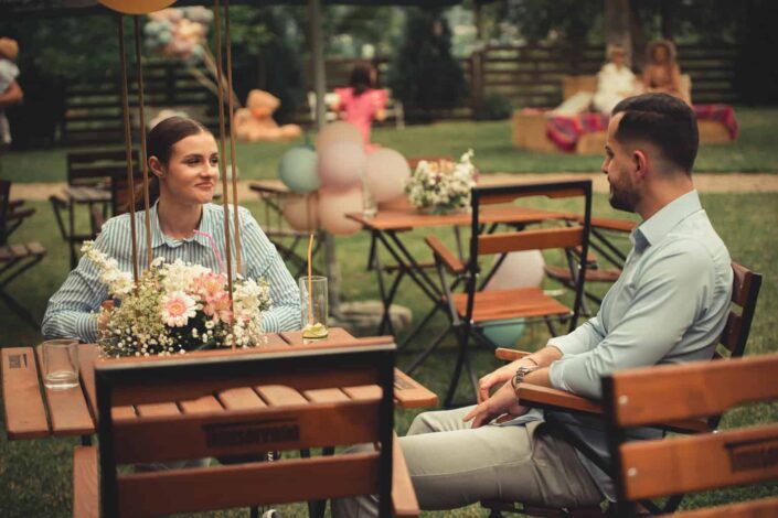 Meeting of woman and man in garden