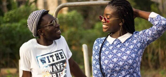 Couple Looking at Each Other While Smiling