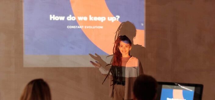 Smiling woman doing a presentation