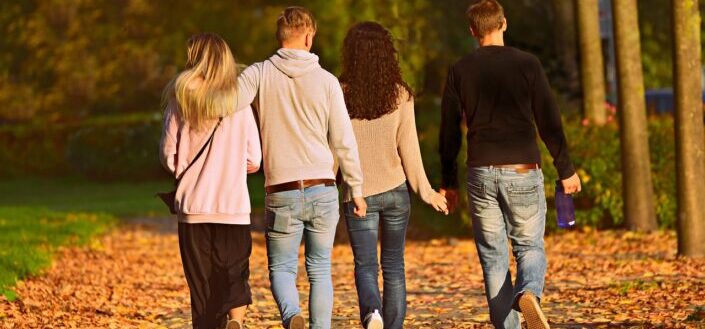couples strolling at the park