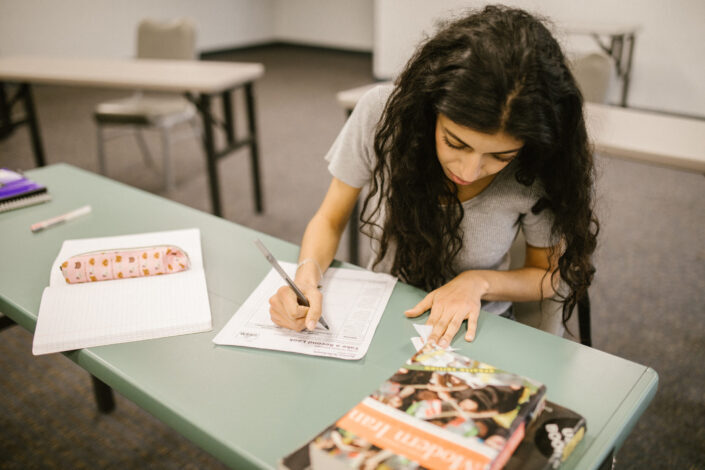 young lady taking an exam