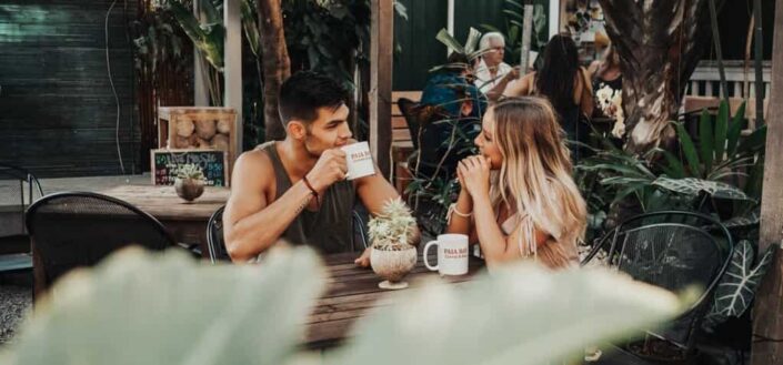 woman and man sitting at table